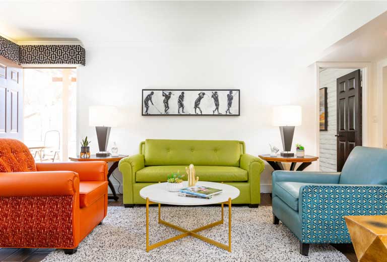 Hotel retro orange, green, and teal living room